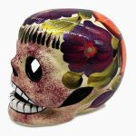 cráneo mexicano de ceramica pintado